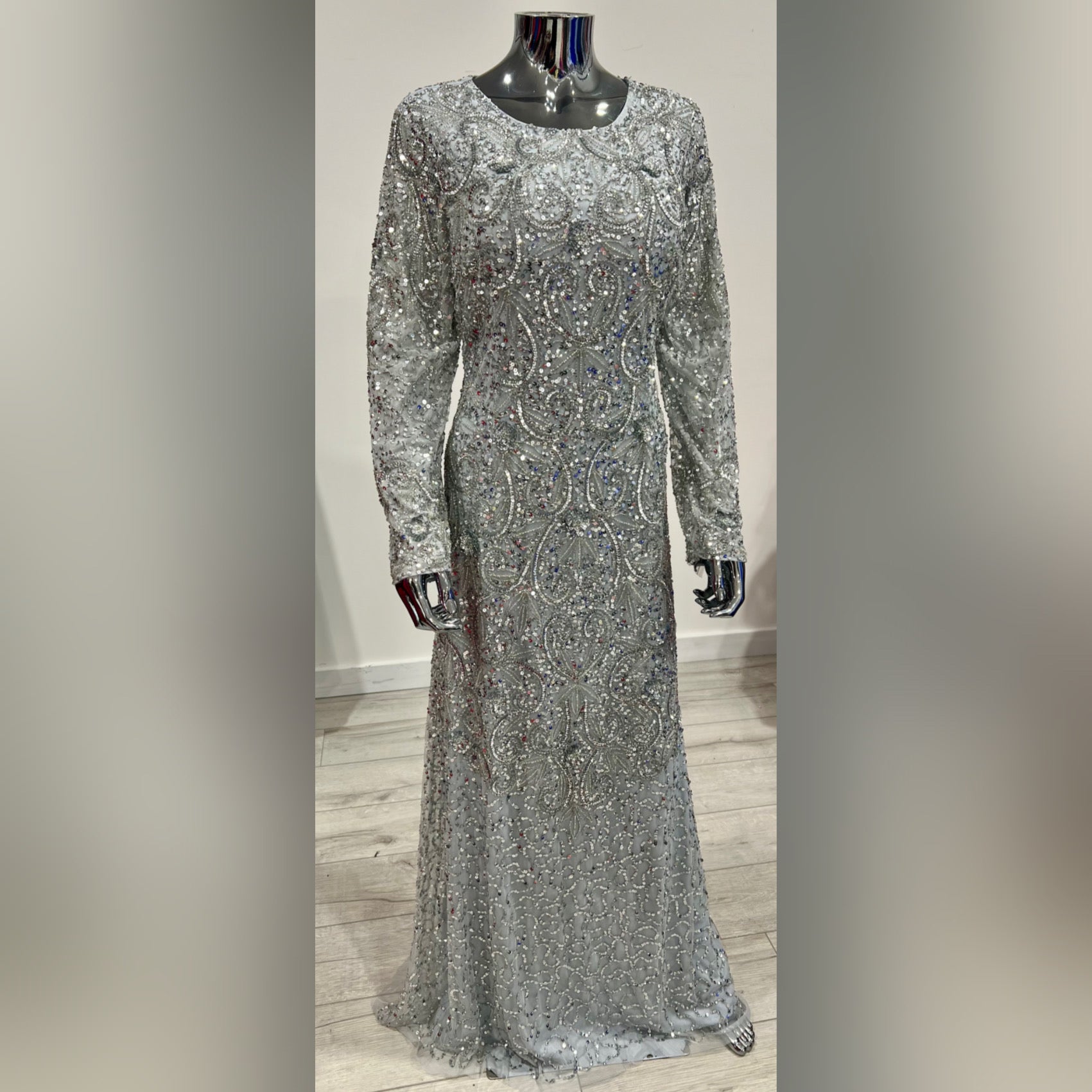 MG0555 - SILVER LONG SLEEVE HEAVY BEADED EVENING WEAR MG's Couture MG0555 - SILVER LONG SLEEVE HEAVY BEADED EVENING WEAR MG's Couture