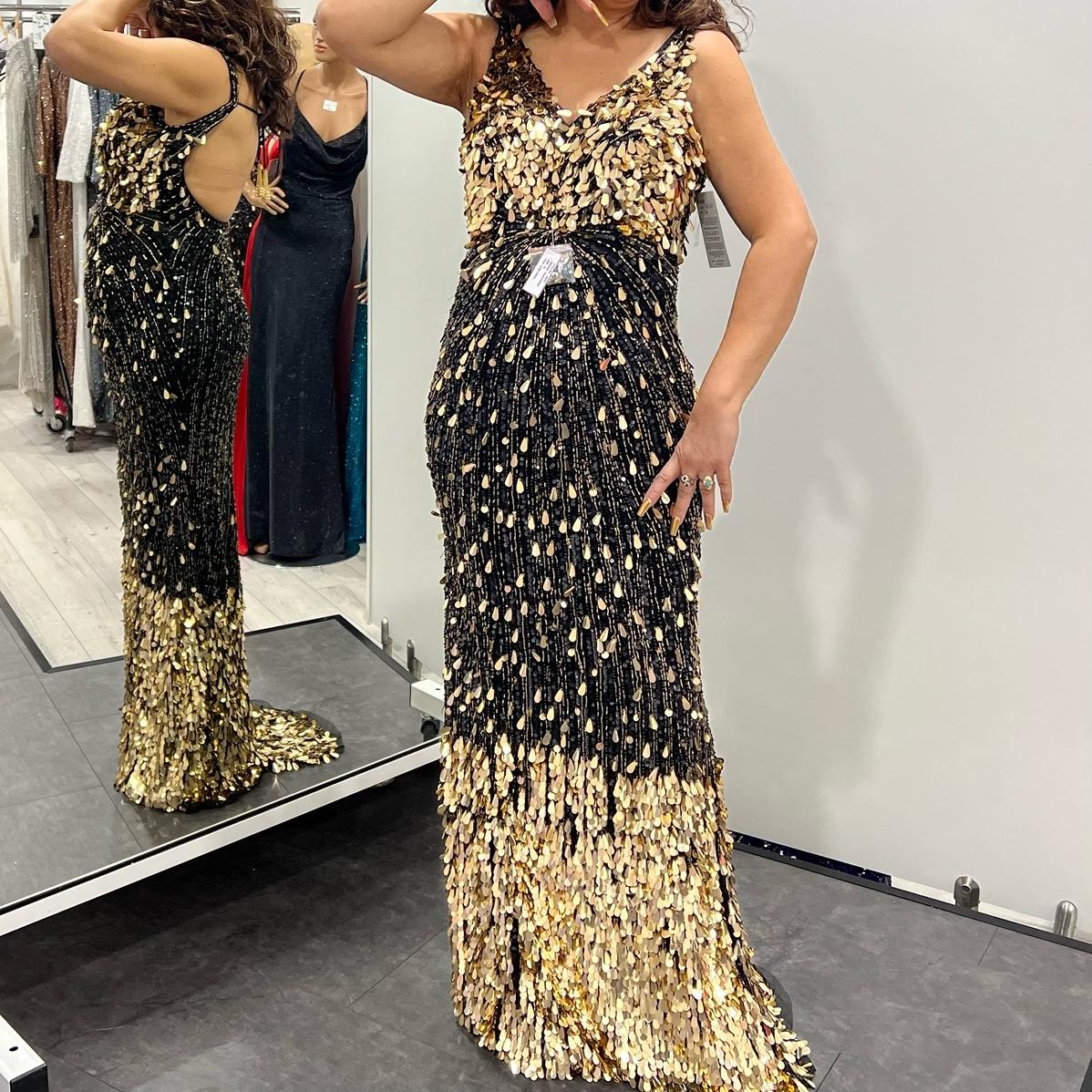 Backless Fishtail Sequinned, beaded, frilled dress MG's Couture Backless Fishtail Sequinned, beaded, frilled dress MG's Couture